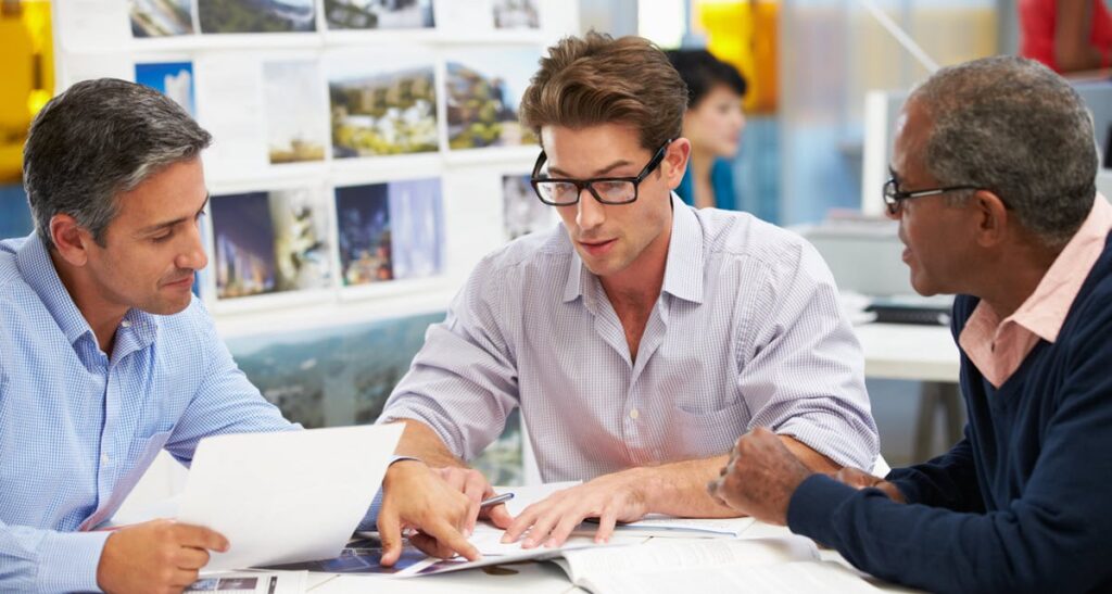 Web Copywriting Content Creation Collaboration Connecting with Your Audience - Staff Meeting with copywriters to review web copy